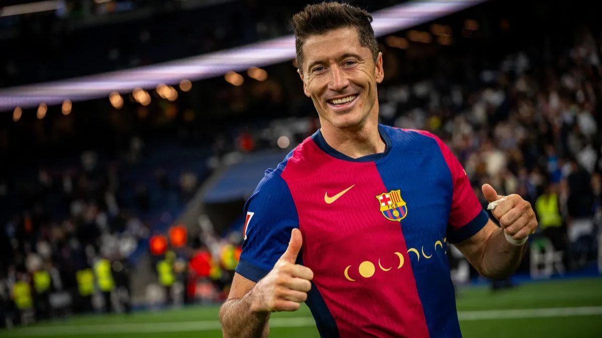 Robert Lewandowski celebrates a Barcelona victory over Real Madrid