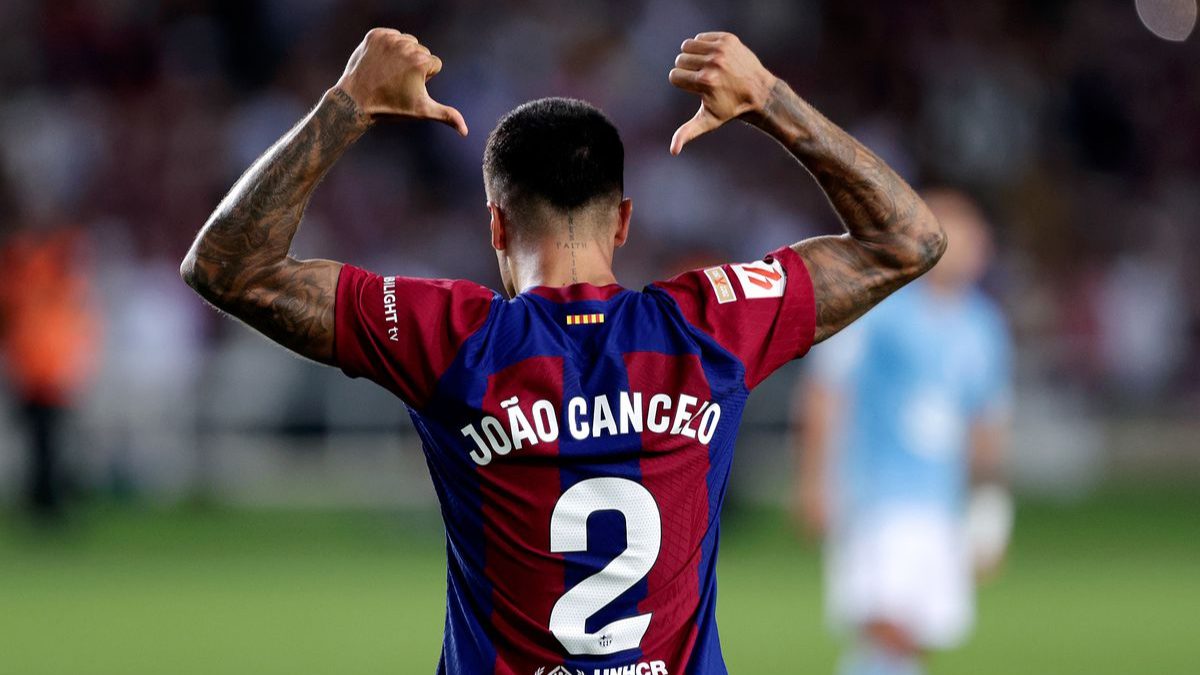 Joao Cancelo celebrates a goal scored with Barcelona
