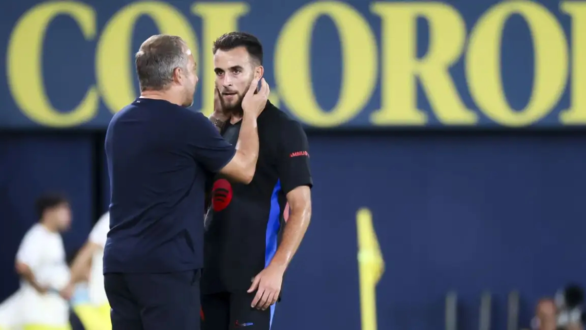 Hansi Flick y Eric García tras un partido del Barcelona