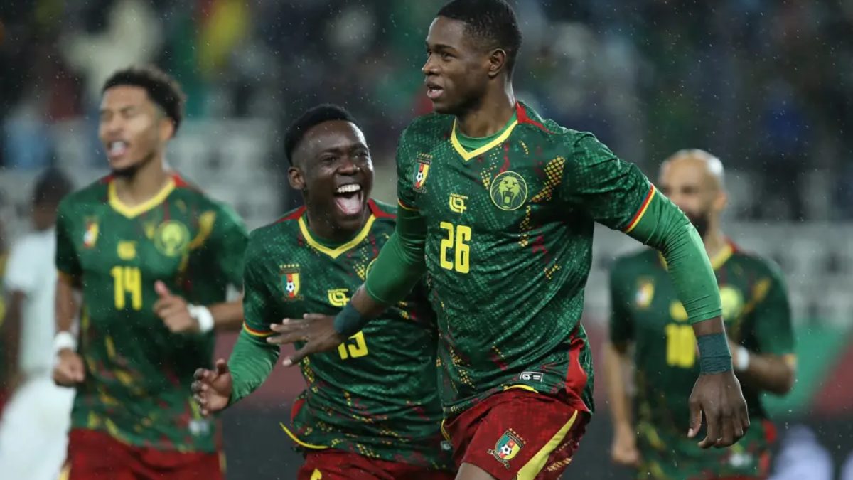 Christian Kofane celebrates a goal scored with Cameroon
