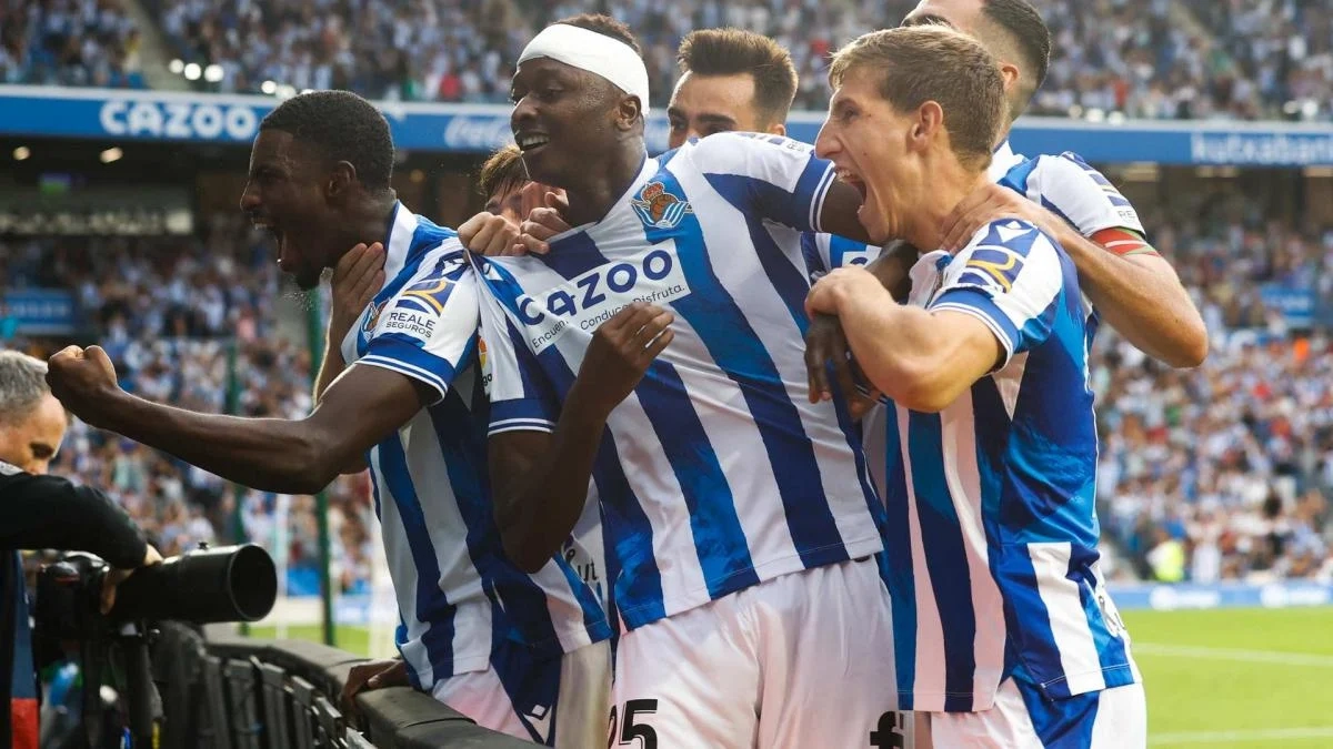 The Real Sociedad players celebrate a goal by Umar Sadiq.