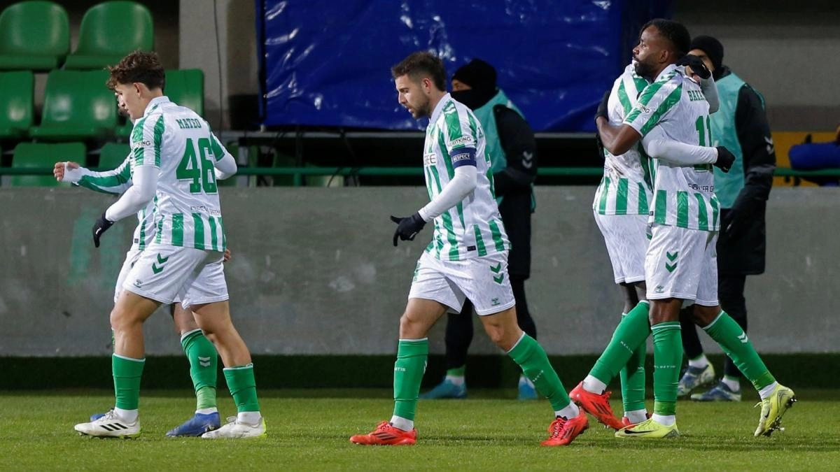 The Real Betis players celebrate a goal