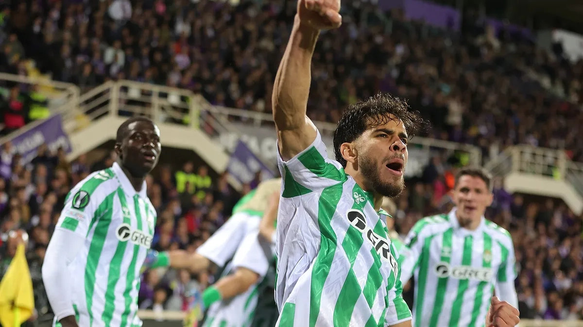 The Real Betis players celebrate a goal