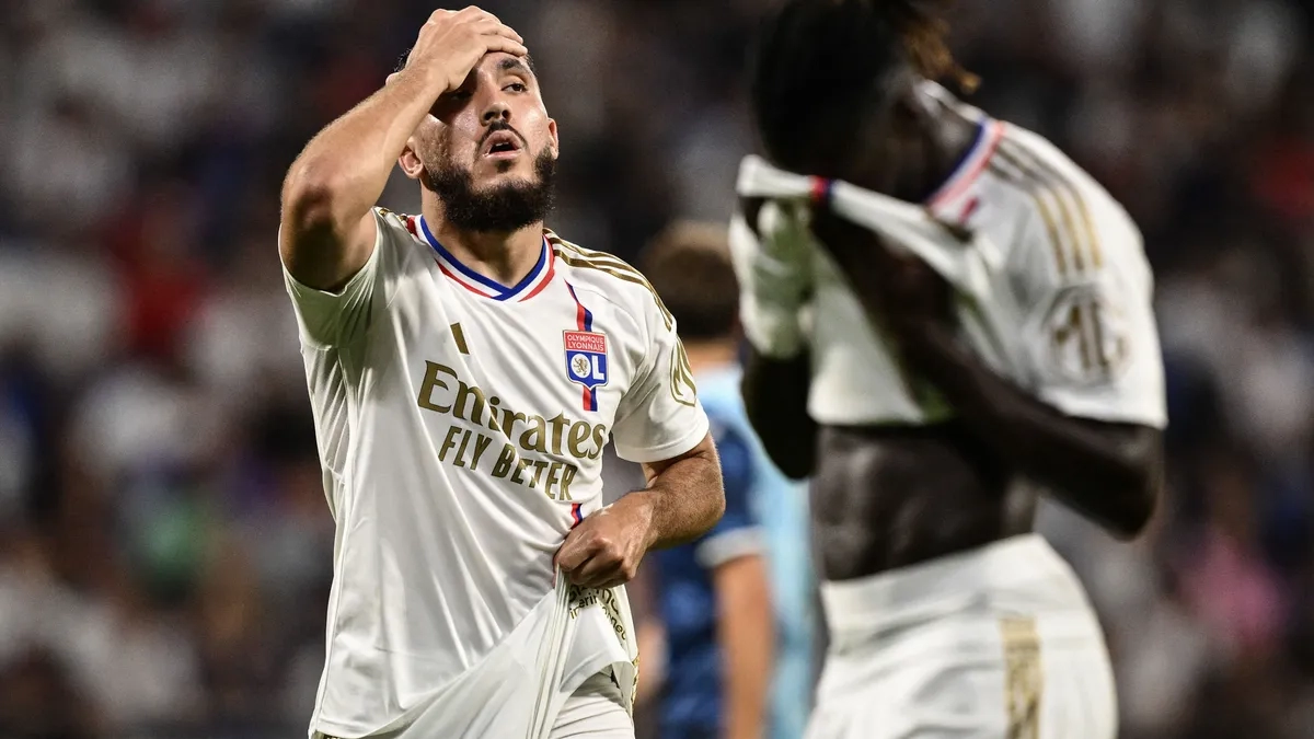 Los jugadores del Olympique de Lyon se lamentan