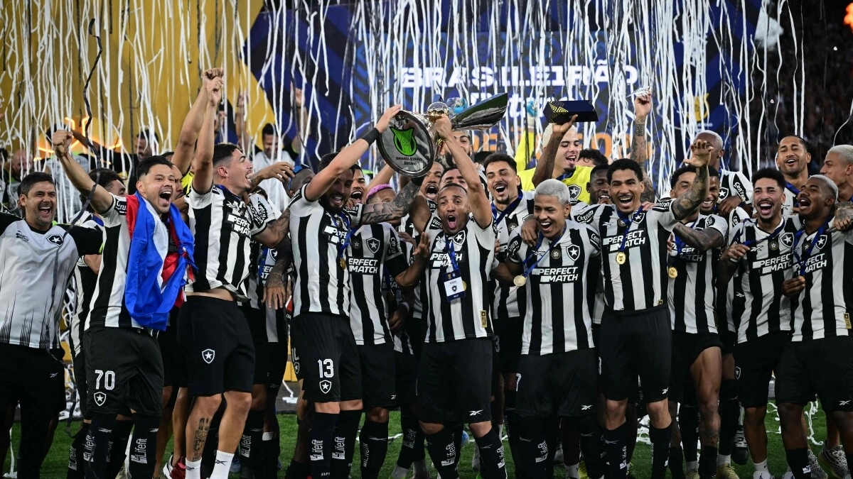 Botafogo players celebrate a title