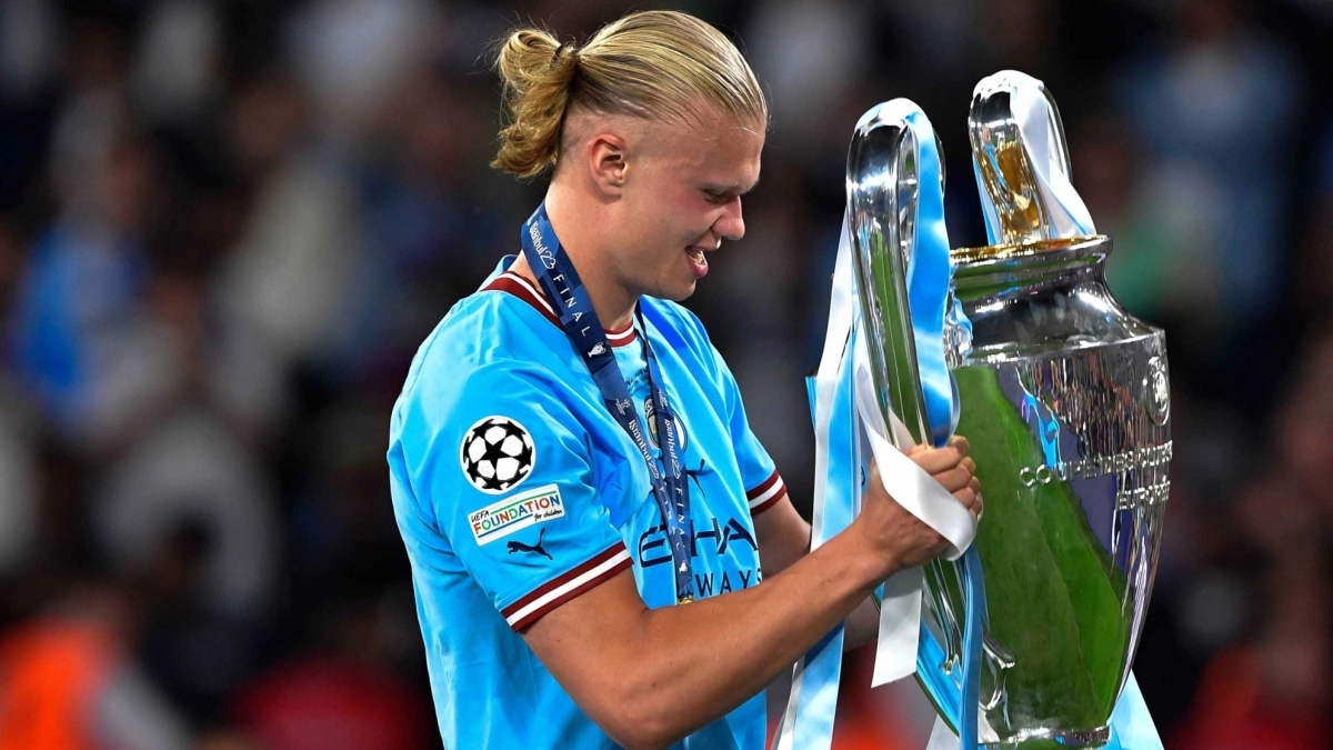 Haaland lifting the UEFA Champions League trophy.