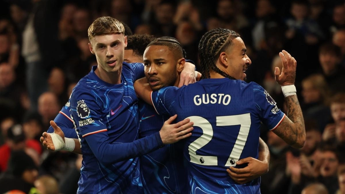 Chelsea players celebrate a goal.