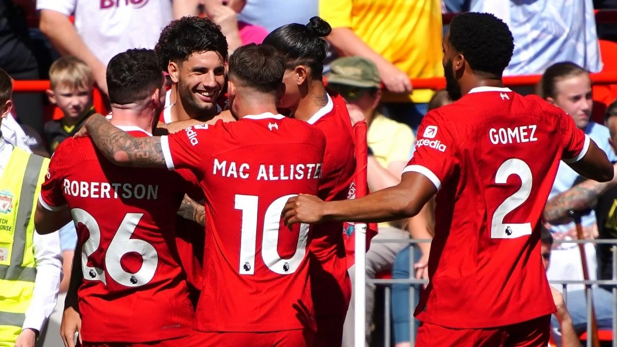 The Liverpool players celebrate a goal