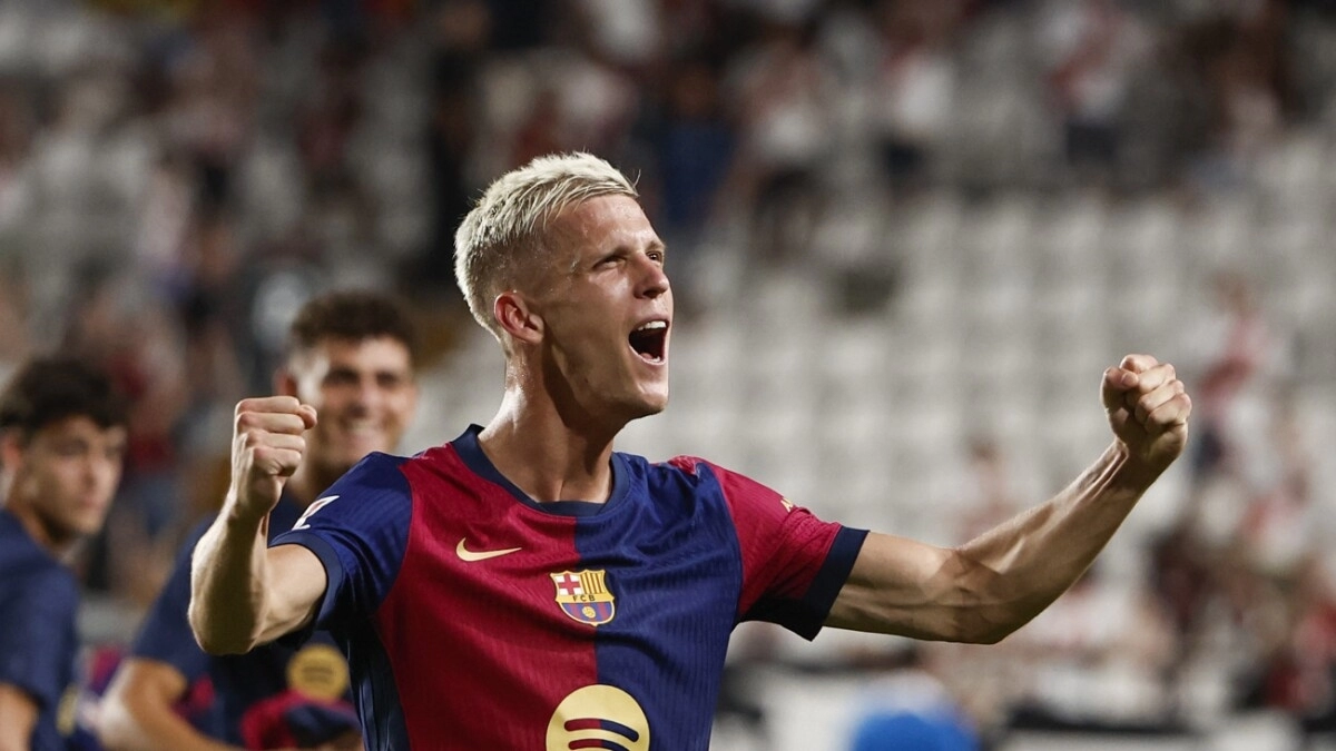 <p>Dani Olmo celebrates a goal with Barcelona</p>