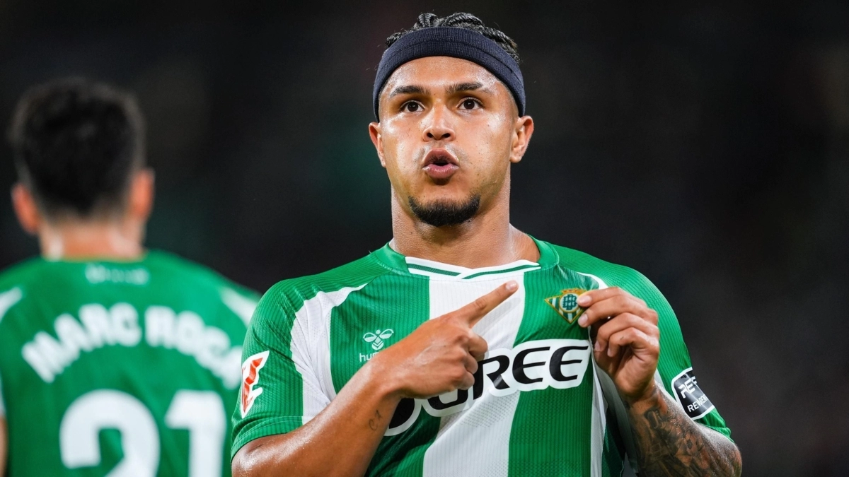 Cucho Hernández celebrates a goal with Real Betis.