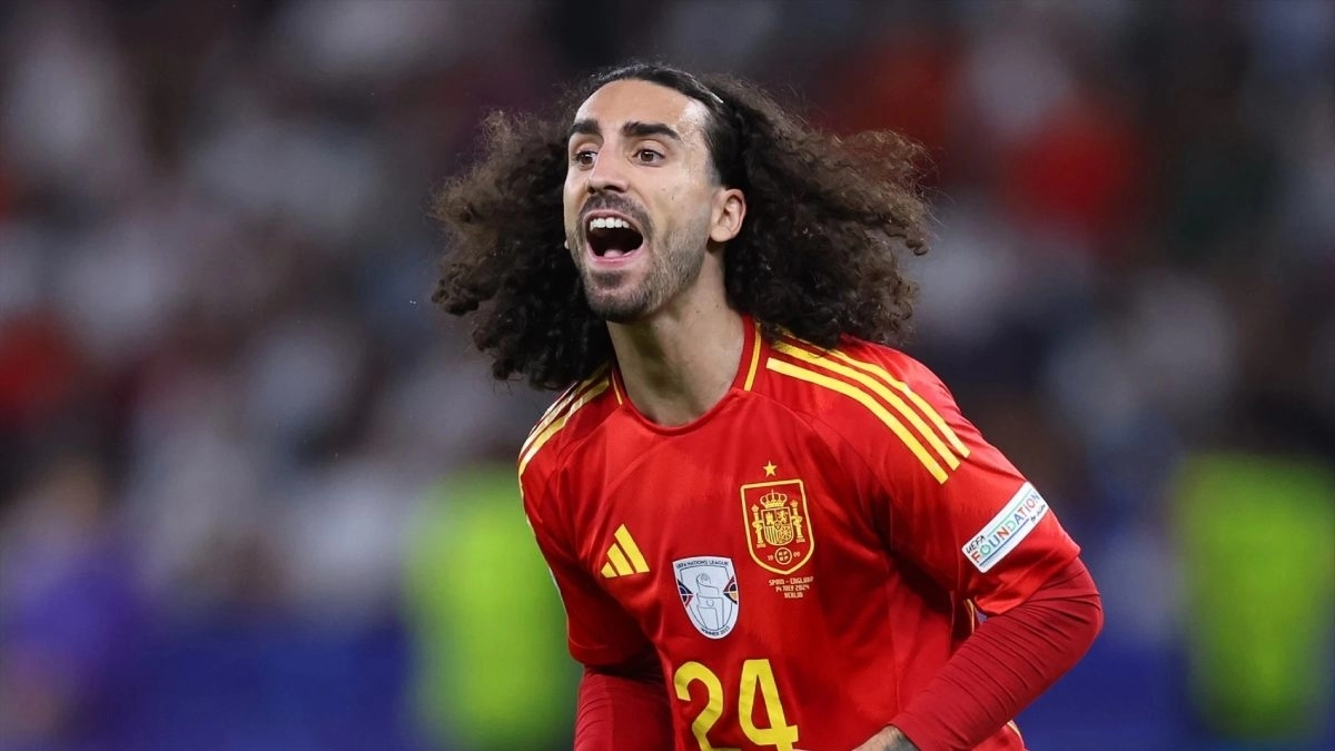 <p>Marc Cucurella celebrates a goal with Spain</p>