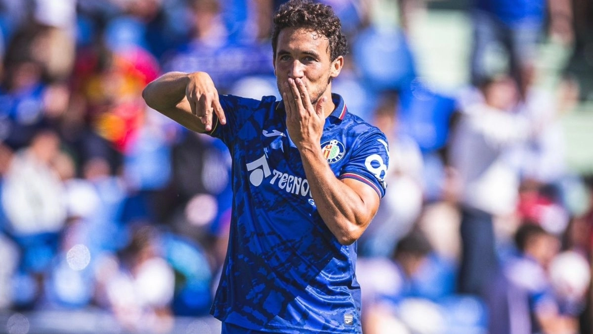Luis Milla celebra un gol anotado con el Getafe