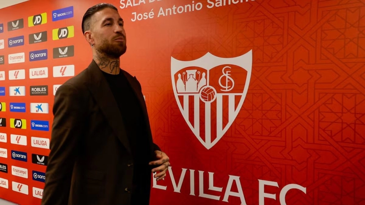 Sergio Ramos alongside the Sevilla badge.