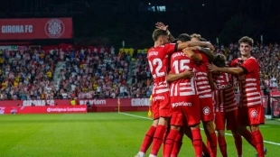 The Girona players celebrate a goal against Montilivi.