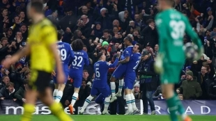 The Chelsea players celebrate a goal