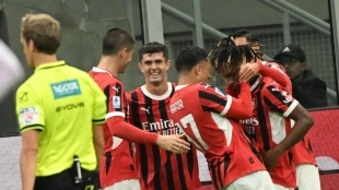 Los jugadores del Milan celebran un gol