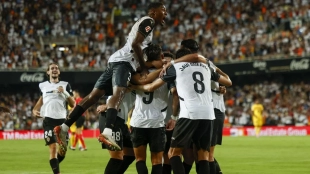 Valencia players celebrate a goal