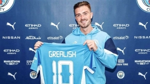 Jack Grealish posing as the new signing for Manchester City