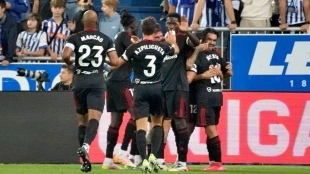 The Sevilla players celebrate a goal